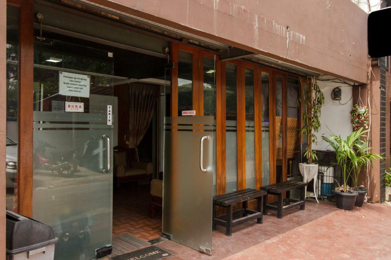 RedDoorz Syariah At Taman Bendungan Asahan Jakarta Bagian luar foto